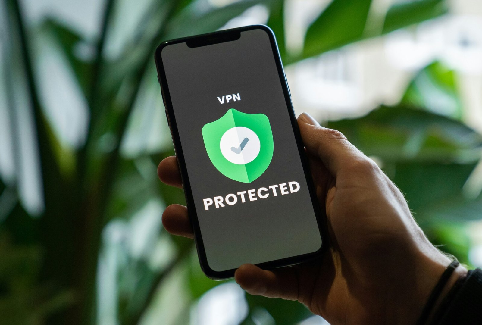 Disclosure 1 iPhone with VPN service enabled in hand