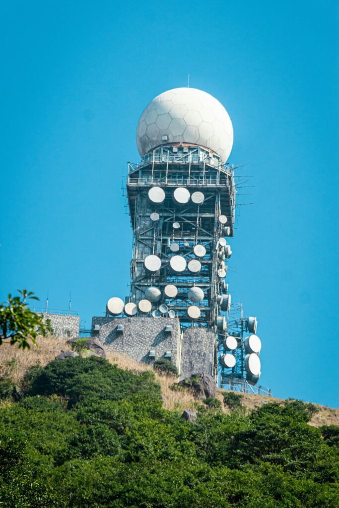 a very tall tower with a lot of antennas on top of it