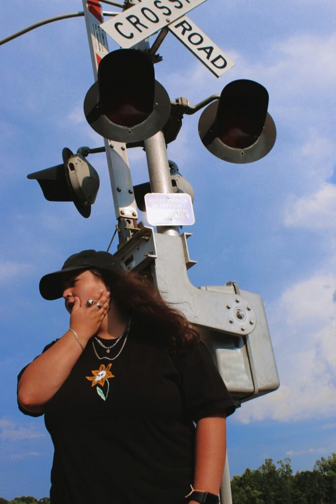 woman standing in front of traffic lights